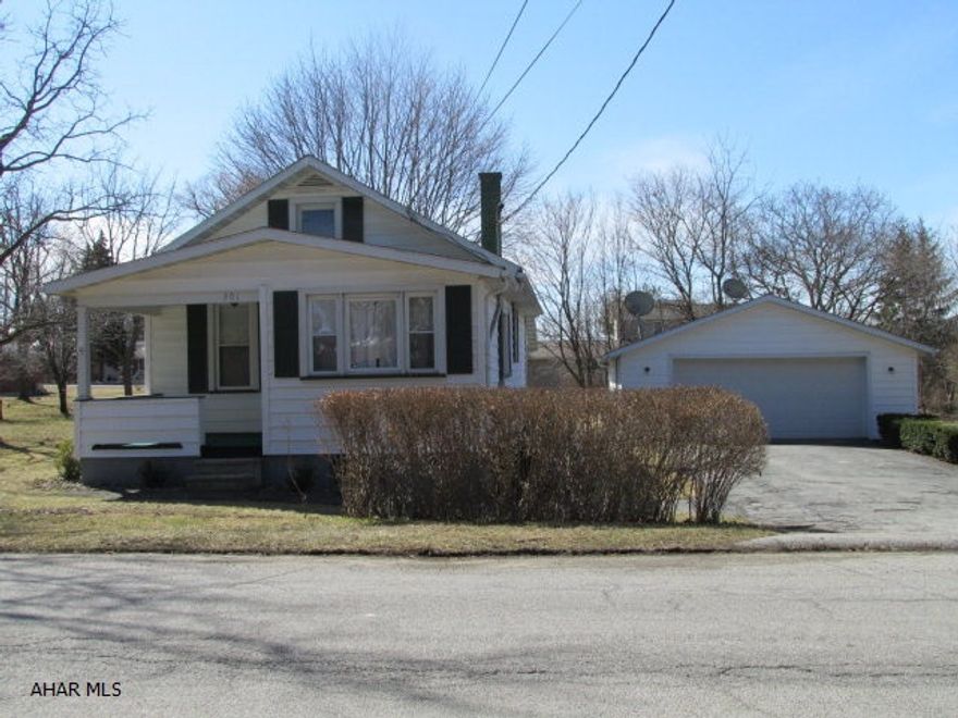 Sweet one story, living room, eat-in kitchen, 2 bedrooms, full bath, 2 car detached garage. Replacement windows, vinyl siding, newer roof, furnace, updated electric (100 amp breakers), new garage door with opener. Full unfinished basement, great covered patio in rear level yard. Property borders stream, additional side lot with gate.