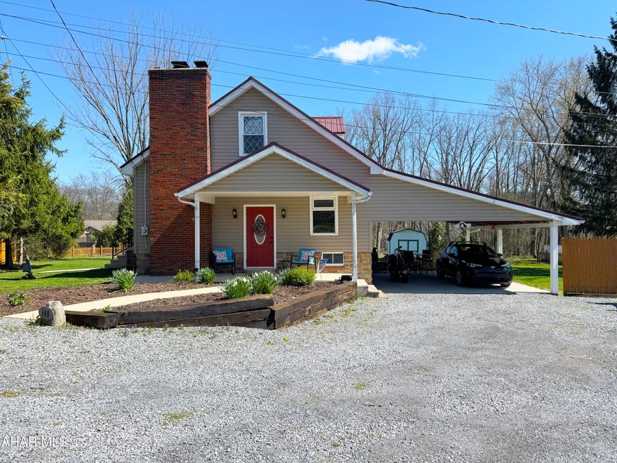 This charming home is situated on over half an acre, nestled within a lovely neighborhood in Hollidaysburg, PA. Its fabulous backyard is the perfect spot for playing, barbecues, gardening, and more. Outdoor relaxation, tinkering, and play are always possible in the shade and cover of the attached carport. This move in ready home has just what you need and want as it provides three bedrooms, two bathrooms, and additional cubbies and space throughout. It has the loveliest eat-in kitchen and a living room fit with a beautiful fireplace and picture window. The full basement is an added bonus with its storage room, laundry area, workshop space, and wide open layout for a home office, gym, play area, craft room, or den.
Not only will this property be your home sweet home, but it is just minutes from golf courses, Blairmont Club, Canoe Creek State Park, Chimney Rocks Park, Hollidaysburg's Historic Diamond District, and just over the hill from Altoona's Altoona Curve, shopping, dining, and entertainment. A short drive will lead you to Raystown Lake, Blue Knob, and State College.
