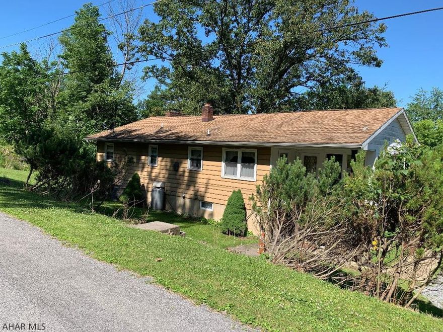 Private area in Snyder Township, 3 Bedroom, 2 Bath with finished basement and woodburning fireplace on over an acre of ground, newer kitchen, windows. Built-in bar on lower level. Lower level could be and in-law suite.