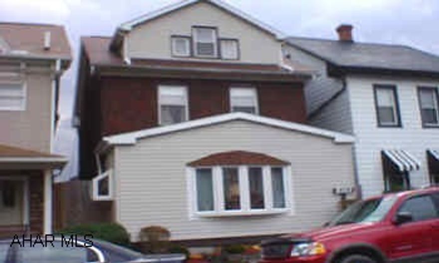 You'll love the wood beam ceilings, wainscotting, plus many updates, newer roof, newer furnace with C/A, thermo windows, covered rear deck with under storage, and off-street parking. Priced right! Call Hank.