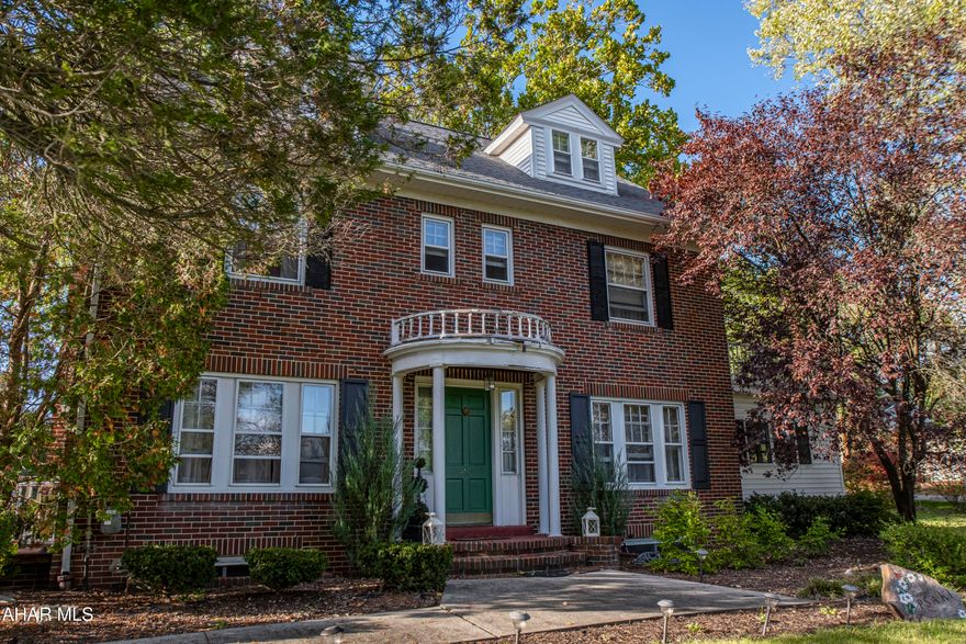 Elegant and spacious Federal-style home in the desirable Sylvan Heights area of Hollidaysburg. This stately 4-bedroom residence sits on a 3/4-acre corner lot and includes a detached garage. Boasting 2,910 square feet, the home features four generous bedrooms and beautiful hardwood floors throughout.