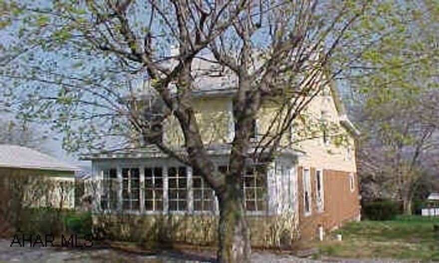 Totally remodeled inside.  New carpet, new shingle roof, remodeled kitchen and bath.  Like new.  Must see inside.  2-car detached garage. 1st floor bathroom.