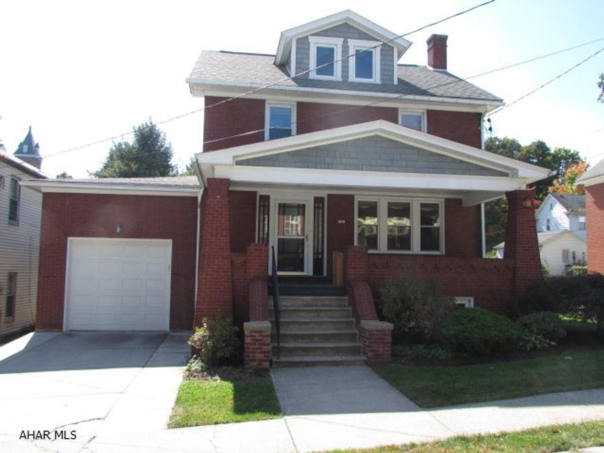 Well maintained home in Hollidaysburg Borough, walking distance to the downtown and the schools.  Brick exterior with large covered front porch.  Attached garage with keyless entry, security system, walkout finished basement, fenced in back yard, wood floors though out with new carpeting on the stairways and though out the basement.
