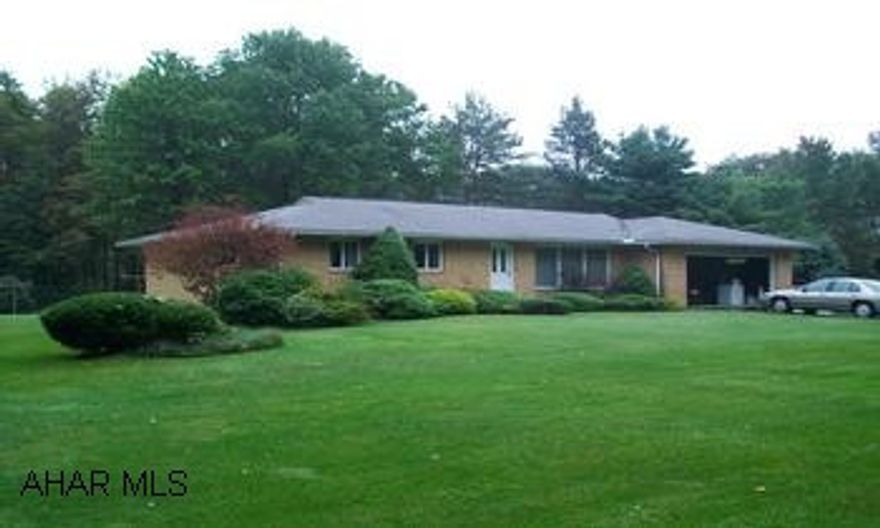 Brick ranch on large lot with 2 car attached garage.  Lots of storage, heat using oil or wood.  Must see!  Call Kara @ 814-312-5160