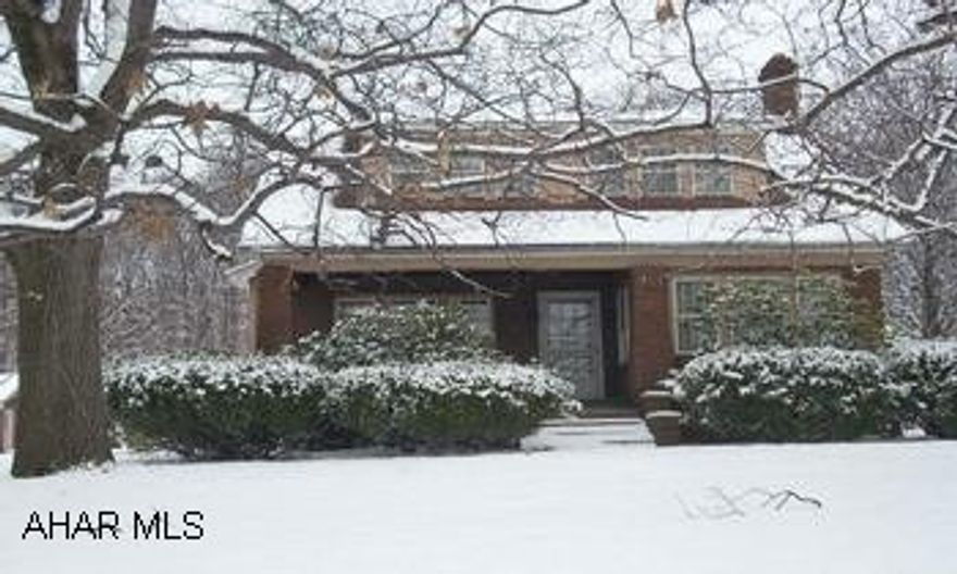 Large home on terrific private corner lot.  Nice size 2 car detached garage. Home needs updated.  Seller to have electrical upgraded to 200 AMP. Hardwoods on 1st and 2nd floor. This home has a lot of charm but needs TLC.  Home is being sold in "AS IS" condition. Call Dianne 329-1856 .