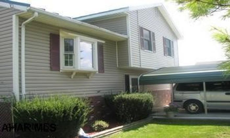 LOOK!  HAVE YOUR OWN 1 ACRE LOT IN THE COUNTRY WITH A NEWER, VERY COZY 5 BEDROOM MULTI-LEVEL HOME IN NORTHERN BEDFORD SCHOOL DISTRICT.  THIS HOME HAS AN OAK KITCHEN, NICE SIZE ROOMS, NEW CARPET, FENCED YARD, VERY MODERN HOME WITH NEW METAL ROOF.  ALSO IT HAS A DETACHED 40X52 GARAGE WITH 12 FOOT DOORS.  SO MUCH VALUE!!!!!