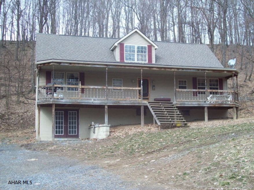 Lovely private location. 4 bdrm, 2 BA cape cod w/walk-out basement on 5 acres. Finish this home the way you want, to make it truly yours!