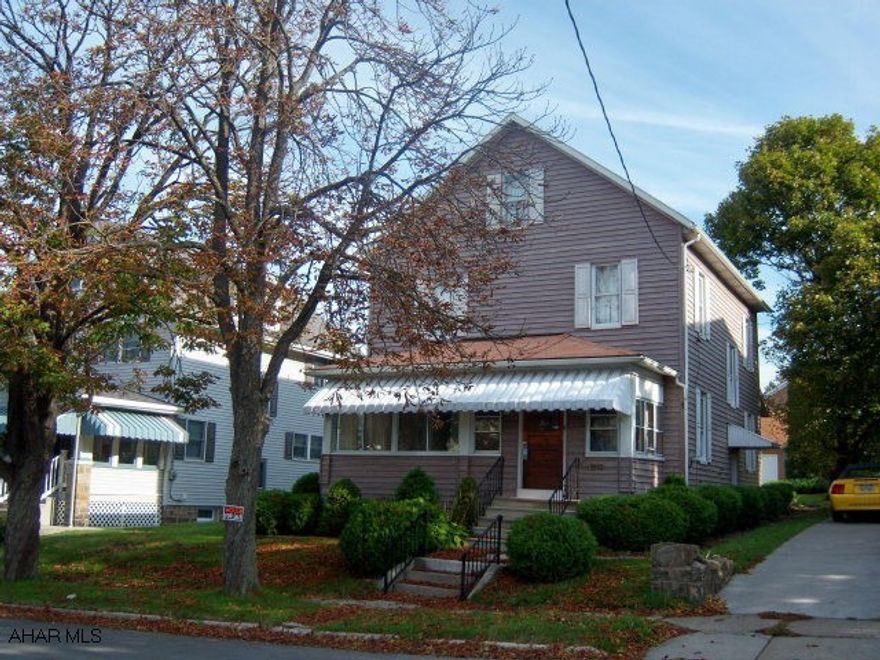 Older home, nicely maintained. Beautiful character & wood work throughout. Enclosed front sunporch, big dry basement. Radiator heat.