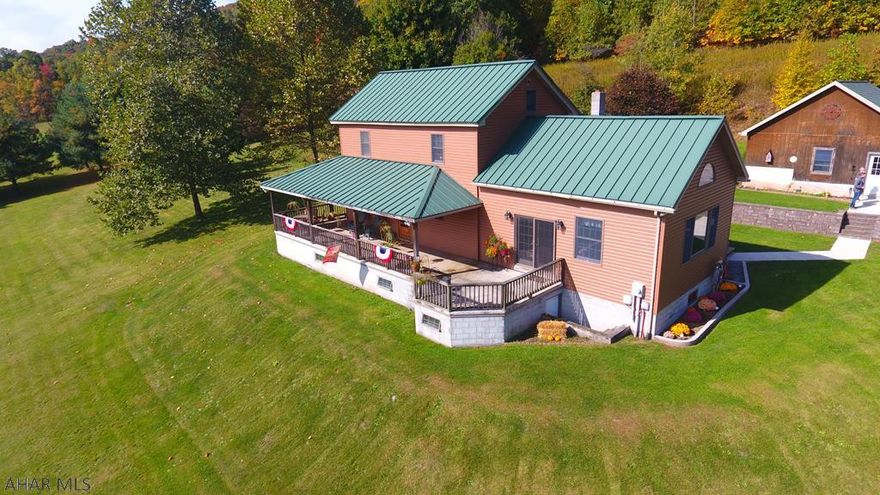 UNIQUE. BEAUTIFUL. UNPARALLELED.  These three words are the best I can use to describe this unbelievable property.   Sitting on Just under 7 Acres, This home was originally a 1810 Log Cabin.  Over the last 30 years the owners have done copious amounts of updates to the property. Enjoy the Cozy Fireplace in the Family room, or Sit in the Great room and enjoy the majestic views that this home has to offer.  With 4 Garage bays, there is plenty of space for toys and tons of storage space throughout the home.  Some other features are 2nd Floor Laundry, an amazing reading loft overlooking the great room, and hold your hats friends - A WINE CELLAR! This one of a kind room in the basement could hold all of your treasures.  You will NOT want to miss your opportunity to view this rare gem in Tyrone!