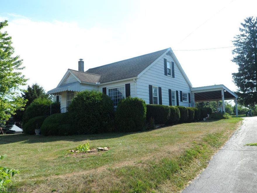 Spacious 1 1/2 story with 2 large lots on nice country setting.  2 sheds, upper level has a huge Bonus Room which could be used as 3rd Bedroom, oversized attached garage.