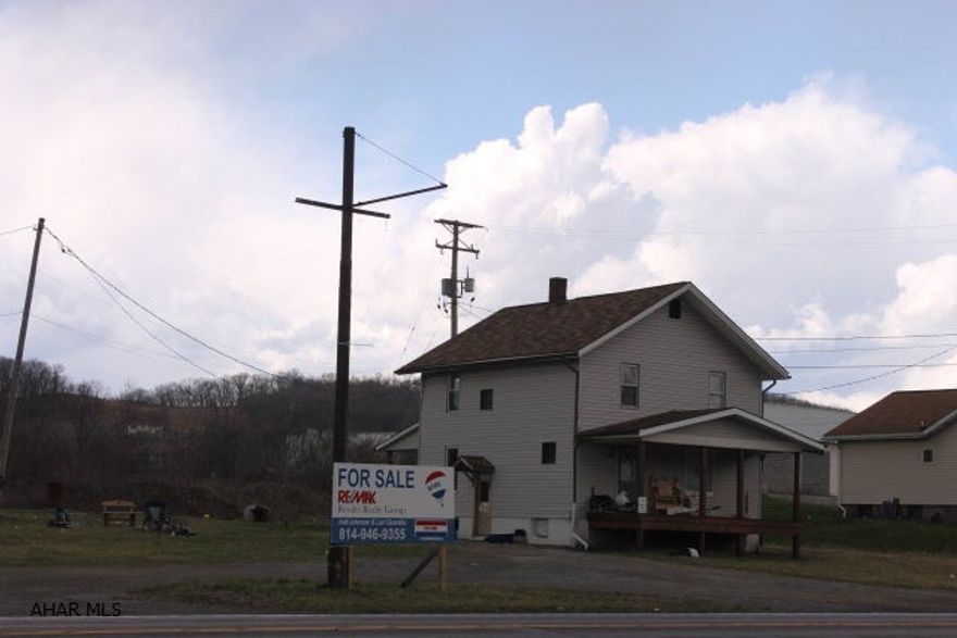 Many possibilities for this property that sits on a high traffic road close to  I-99 and East Freedom Walmart. 3 Bedroom home on almost an acre with low taxes. The adjoining property is also for sale. Seller will consider any reasonable offer.