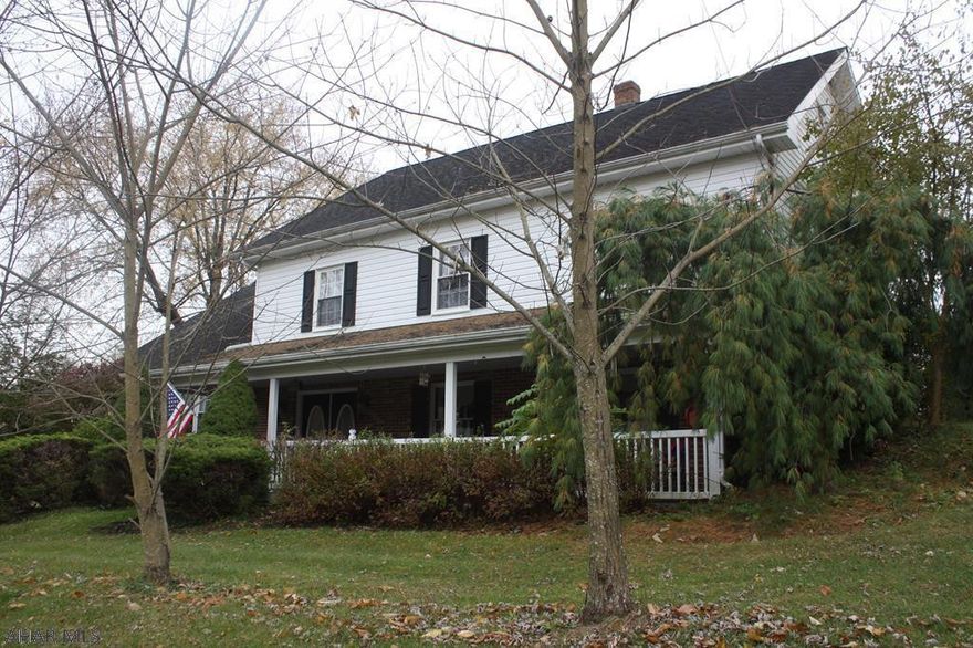 If you like family gatherings and out of town guest, you will be able to accommodate everyone in this home.  Featuring a large kitchen with island and extra large range with 2 ovens, large dinning room with walk out to large front porch for seating and entertaining all your family and guests,  a great room with extra area.  The list goes on, with 1/2 bath and Laundry on the first floor! The second floor has a large bonus room that can be another bedroom, It is being used as an office. There are also 2 other large bedrooms a full bath and a Master Bedroom with a large sitting room attached and Master Bath. Third floor is 2 BR's and another Full Bath.  Call Now!!!  5BR's, 3 and 1/2 Baths Large Kitchen and DR., Swimming Pool, first floor Laundry