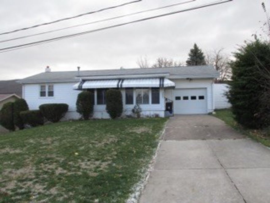 1 Story Ranch, 2 bedroom, 1 bath, hardwood floors through out, central air, large lot, good mechanics, enclosed front porch.  Convenient location, being sold as is.