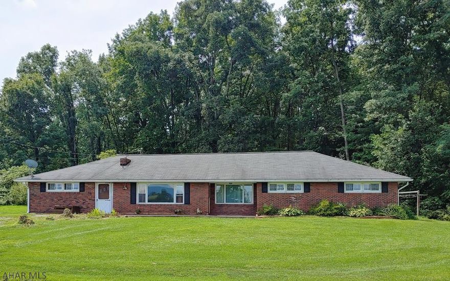 3-4 bedroom, 2 bath home with panoramic views of Northern Bedford County countryside. Brick, one-story home on a flat lot with updated windows, Mother-in-law suite, new flooring through most of house, and a lovely, open kitchen and dining area.  Enjoy some fall foliage and check out this home today!