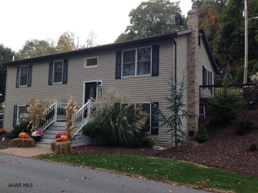 Maintenance free home with many updates- including newer appliances. Professional landscaping to the 3BR, 2.5 BA home. A humidifier system, central air and underground dog fence. Plus close to town and schools. Sit on the deck for a great view of Bedford!