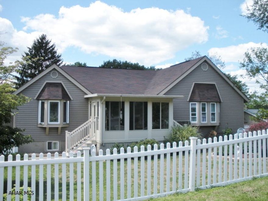 Awesome 3-4 bedroom home located on a corner lot close to Altoona Campus. This home has many updates, newer roof, windows, & vinyl siding. 3 season room, kitchen w/fireplace, formal dining room, large living room, master bedroom w/full bath, lower level family room w/wet bar, laundry, & half bath. Plus this home includes an amazing in-law suite with oak eat-in kitchen, dining room, living room, bedroom, & full bath. This is a must see home!