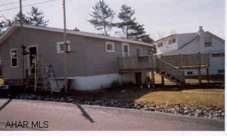 Darlin 2 BR completely redone on corner lot in Allegheny twsphip.  Lg deck & carport