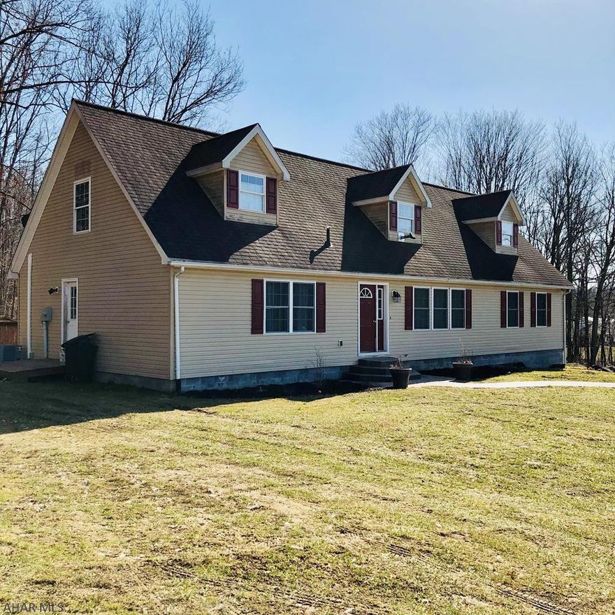 Large Cape Cod home on 3 acres, with 4 + Bedrooms and 3 full baths. Plenty of parking, even for your RV.  Plenty of back yard space off the rear deck. Spacious house has lovely archway foyer that leads to a large Living Room and Dinning Room. There is a spacious eat-in  kitchen and 1st floor Laundry Room. Check out the 1st floor Master Suite with master bath, Jacuzzi Tub and Dbl sinks.. There are 2 more bedrooms on the first floor with another full Bath.  The 2nd floor is a huge space with 2 bedrooms, a game area and another full bath. The House is heated with 2 pellet stoves. There is an outside wood stove they have not been using. Central air furnace also has heat as a back up. The basement is huge and  just waiting to be finished..24 hr notice