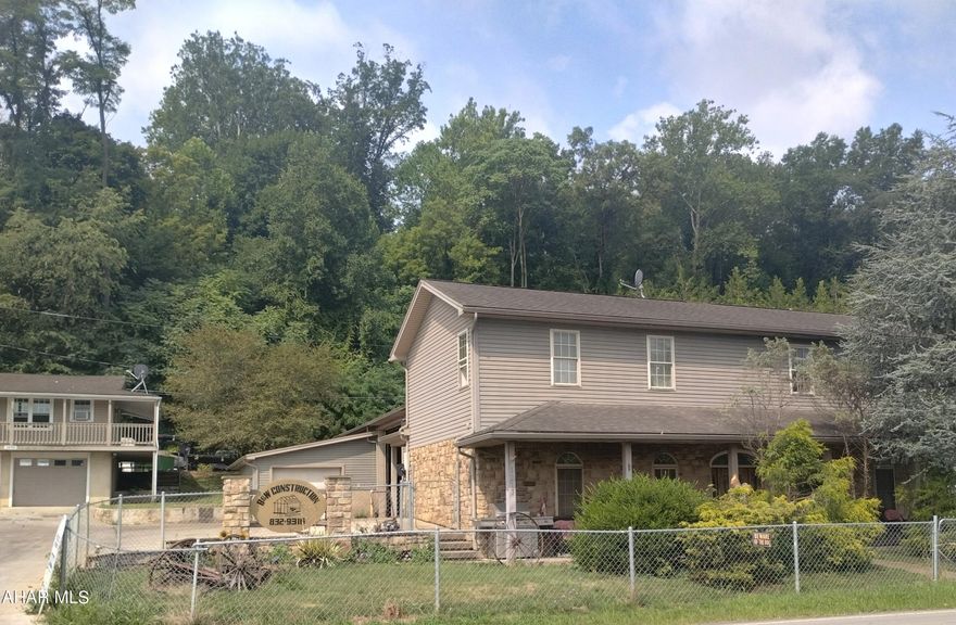 Great Opportunity to have your own garage and rentals plus a house to live in . Built in 2008 the Shop / Garage has cement flr with radiant heat in flr , heat pump w/ ac, and oil forced air , 1000 gallon oil tank in ground and 300 gallon out side,  extra insulated, 8 inches thick  cement, a office and a Sceptre Security System.  Partially heated  driveway and the sidewalks and 1 bedroom apt w/ oil heat and a 2 bedroom apt w/ electric heat, hardwood and tile floors with squ ft of 1840.  Built in 1958 recently remodeled   the Raised Ranch house has 2 bedrooms, kitchen , living room, full bath w/ laundry ,  hardwood / tile and 2 car garage, squ ft 720,  both properties have city water/ sewer. This is 2 parcels and 2 deeds but selling together . Listed for $325,000