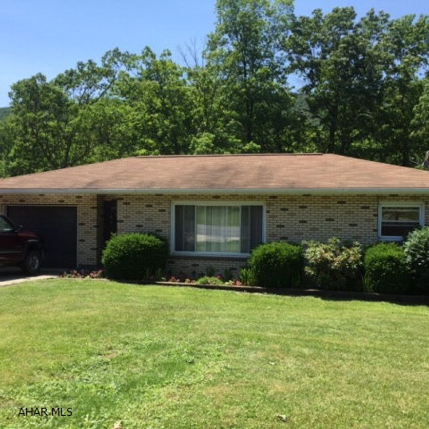 Brick home on a beautiful lot – 2 bedrooms upstairs, 1 bedroom in basement with possibility of a fourth bedroom in basement.  Hardwood floors, family room with fireplace and 2nd kitchen in basement. Screen in porch and inground pool. Fabulous back yard. Multiple heat sources.