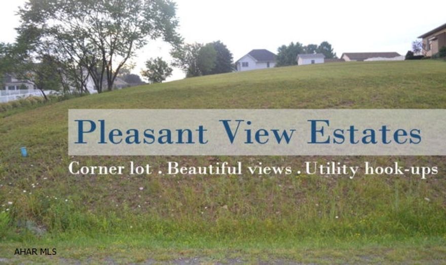 A great lot for your new home!  Good size corner lot available in desired Pleasantview Estates.  Great location with an incredible view.  Water and gas hookups at the property.  A picturesque spot for you to build that dream home.