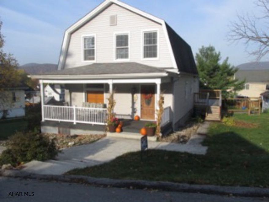 Recently renovated in 2014 charming, original floors in living room, entrance way and all bedrooms, large kitchen with maple cabinets, stainless appliances, first floor laundry with 3/4 bath. Main floor family room with entry to the spacious rear deck. Everything has been done from top to bottom, all sitting on over a 1/3 acre lot. Won't last, call listing agent for details.