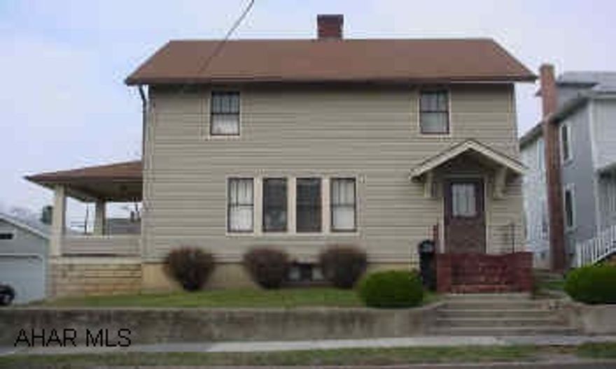 Nice Two Story Dwelling with Great Potential!  Excellent starter home!  Must See! Nice two story dwelling in good condition.  Dwelling contains a brick fireplace in the living room, hardwood floors in living room and dining room under carpet, newly updated 100 AMP breaker box and some wiring, vinyl siding, 15 year old shingle roof, and cozy rear flagstone porch.  MUST SEE!