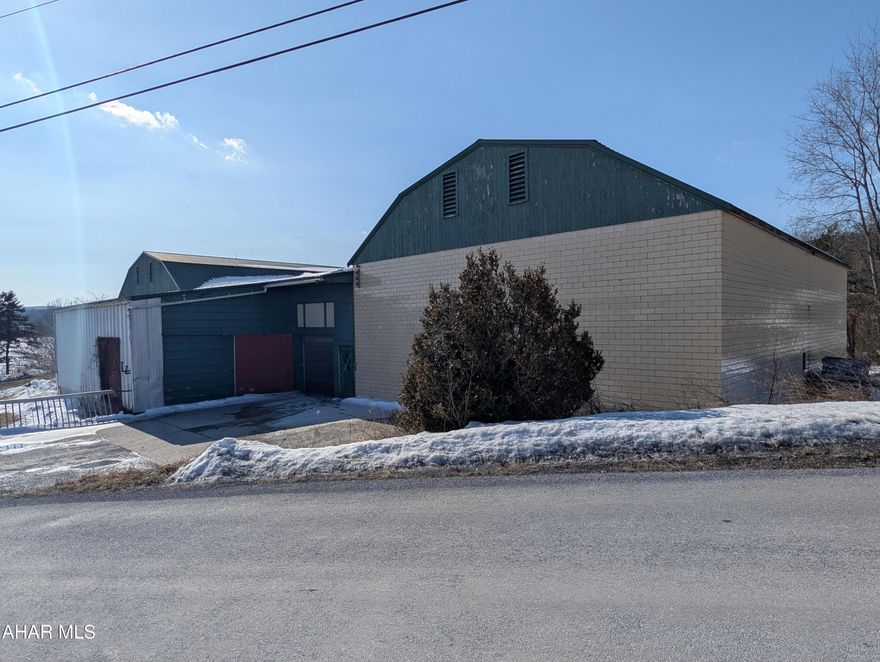Explore your next investment opportunity in the rural Bedford County. PA. Spanning across 1.927 acres, this property offers a world of potential for visionary buyers eager to craft their growing business. 

The defining feature is a versatile storage building equipped with refrigeration, providing ample space for creative endeavors, additional storage, or business pursuits.  This property used to be used for orchard storage and makes a great opportunity for someone wanting to expand their dream. While the building awaits revitalization, its framework provides a strong foundation for endless possibilities.

The generous parking enhances convenience and easy access to an overhead door and loading dock.  If you're an investor or a growing business owner looking to capitalize on growth potential and with dreams of customizing each corner to suit your vision, this property beckons with promise.  Schedule your showing today!