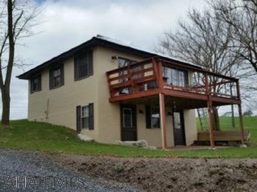 Very private - 2 Bedroom 2 Bath Cabin on 2.27 acres.  Vaulted ceilings, hardwood plank floors, open floor plan.  1 Bedroom Bungalow Cottage with heat and bathroom with outside shower is included with house sale.  Fantastic getaway retreat at $150,000! #JD-430