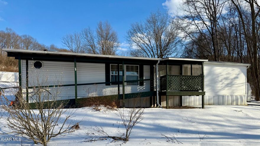 CAMELOT WOODS. Spacious 2000 double wide home offers 3 bedrooms 2 full baths. Well maintained, fairly new paint, new stove, new roof. Open floor plan with eat-in kitchen.  Primary bedroom offers walk in closet and full bath with shower and garden tub! 2 additional bedrooms with plenty of room and full bath.