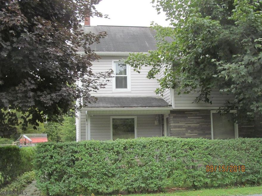 Hidden Treasure! Mature trees & hedge row grace the front of this modest looking home. But wait till you step inside! German engineered flooring & solid oak stairs, doors, woodwork,-throughout. Inviting oak kitchen w/ ample eating area. Updated living rm. w/ fireplace & offset office (playroom? craft room?). Tasteful 1st floor laundry & 1/2 bath combo. Two to three bedroms upstairs plus a renovated full bath. Lots of closet space in this newly finished master. Step out the back door onto the lg. deck w/ pergola perfect for entertaining. Large level yard has room for a grilling area, a large garden & lots of room for the kids to play. Oversized 2 car garage has designated workshop area & finished exercise room.  Electric Pet Barrier.         HOME WARRANTY INCLUDED