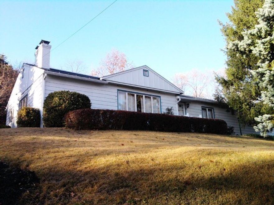 Good quality, 5 bedroom rancher with 2 1/2 baths. Fireplace in living room. Hardwood floors. Central air. Partially finished basement. Large 2 car integral garage.