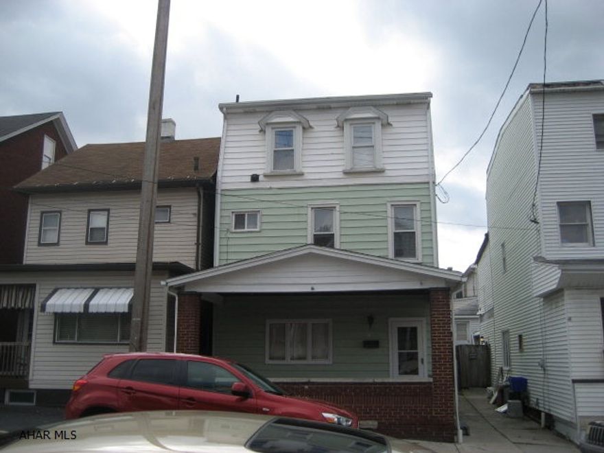 3 Story 5 bedroom with 1.75 baths, fenced yard, 2 car garage is in move in condition. This large 5 bedroom features 2 bedrooms and 3/4 bath on the 3rd floor. Updated electric, high efficiency gasfurnace. 2 car garage. Seller will consider assist