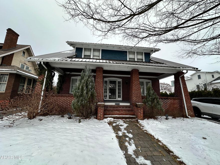Logan Blvd. is home to this 3 bedroom brick home, if you love the feel of tree lined sidewalks this is your place. This location allows for walking distance to Mansion Park, shopping and restaurants. The interior offers hardwood floors throughout, and a wood burning fireplace in the living room. The dining room is perfect for gathering with family and friends to share a meal. The second floor offers 3 bedrooms, nice sized closets and a full bath with corner shower and claw foot tub. Recent updates include a new 100 amp breaker panel, new gas forced air furnace and a newer metal roof. The rear yard is fenced and has a covered patio area. There is a long driveway for off street parking and a detached 1 car garage.