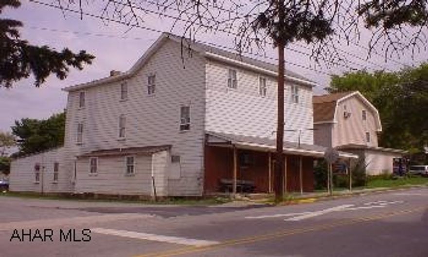 Established business w/ hotel, liquor licenses, all equipment included.  New roof in 2001, new well in 2006, updated electric and plumbing, alarm system, tin ceilings. Historic building restoration grants available.  Quailified Buyers Only! No sign on building.