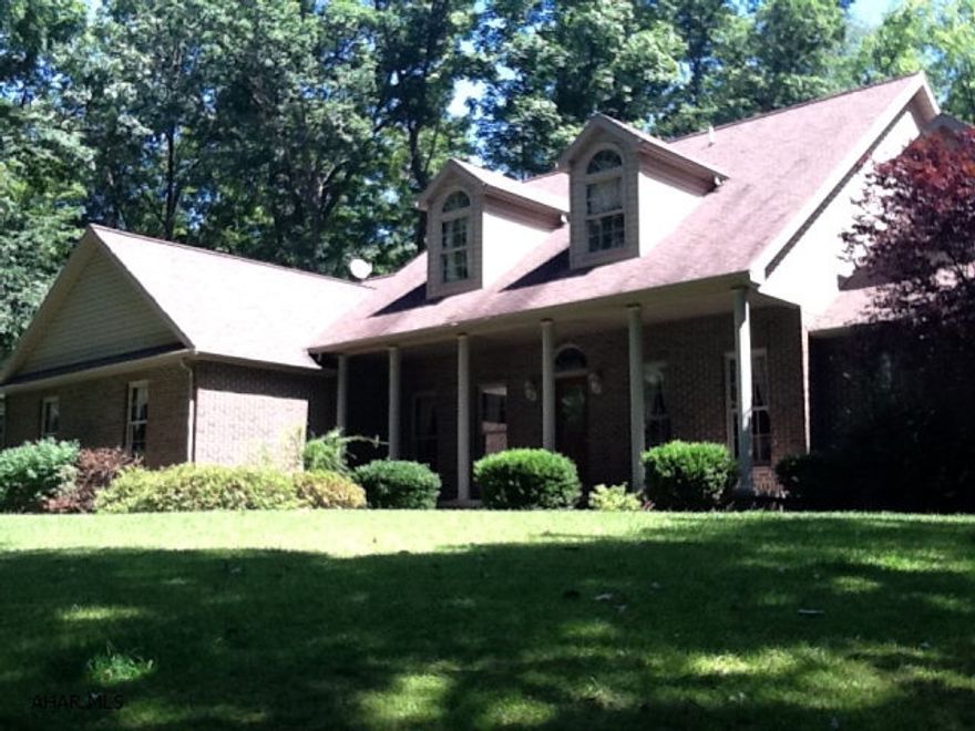 Spectacular very private country home with over 3,100 sq. ft. Large great room with soaring ceilings open to a fantastic landscaped yard with inground pool. Formal dining room and gorgeous kitchen are brightened by a row of 8' windows and glass door. A wonderful sunroom is found just off the kitchen. The main floor master suite boasts tray ceilings, a whirlpool tub and separate shower, walk-in closet and sitting area. Four bedrooms can be found on the second floor. Finished lower level adds additional 2,000 sq ft of living space. One of a kind home in Bedford County.