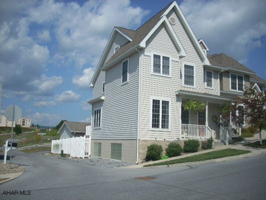 Stunning 4 bedroom custom built, 3 bath end unit townhouse. Hardwoods throughout. Large Living Room and Dining area and foyer. Gorgeous eat-in kitchen w/corian countertops and stainless steel appliances, island and walk-in pantry. Master bedroom has private bath and walk-in closet. 3rd floor has a private bedroom and bath w/large walk-in closet. Lower level is finished w/family room, play area or office and large laundry room. Access to garage and yard from kitchen and family room. Great rear deck w/wonderful mountain view, cute yard totally fenced. Settlement Cotingency.