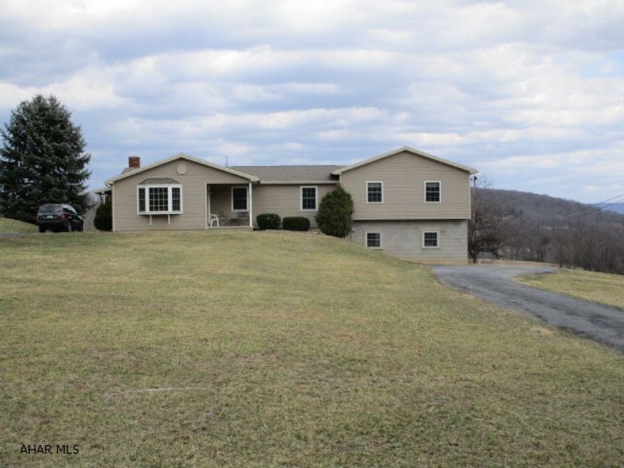 Very well maintained ranch with too many upgrades to list! Remodeled kitchen w/breakfast bar and oak cabinetry, stainless steel appliances, large living room addition, large master suite addition, master bath w/Jacuzzi tub, newer roof, windows and siding. Newer heat pump with central air and oil back-up. Updated floor coverings & paint. Full basement w/ 2-car integral garage. Large 1.91 acre lot.