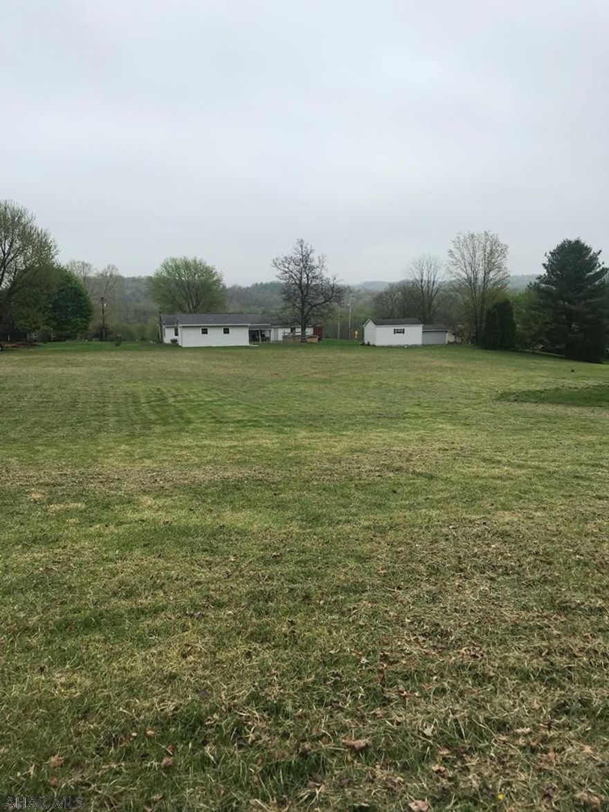 Nice flat building lot with township water and sewerage already in place. Quiet neighborhood just minutes from downtown Bedford.