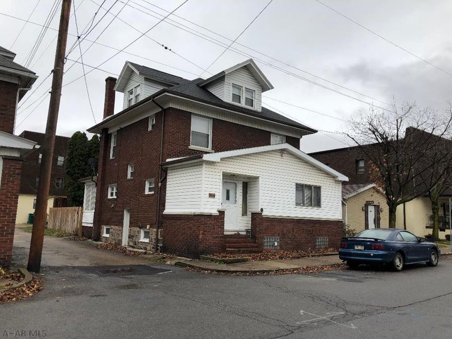 Large Brick and Vinyl Home in a great area. It is priced to sell. Coming in the front door you will see a Ceramic floored entry with a large double coat closet and access to a convenient 3/4 bath for your guests. Beyond that is a large open Foyer with Engineered Hardwood flooring, Fresh Paint and Stairway to the 2nd level. The open concept and Flooring continue into the Living Room and Dining Room. The Large Eat In Kitchen is next with plenty of Counter Space. All Appliances included, The Kitchen also has new Vinyl Flooring, Fresh Paint and a Door to the back Porch and Fenced Yard. First Floor Laundry! 2nd floor has 4 Nice sized Bedrooms with a large center hallway between the rooms. All bedrooms and stairway have new carpet. Finished & Heated Attic for 5th Bedroom. Priced to sell.