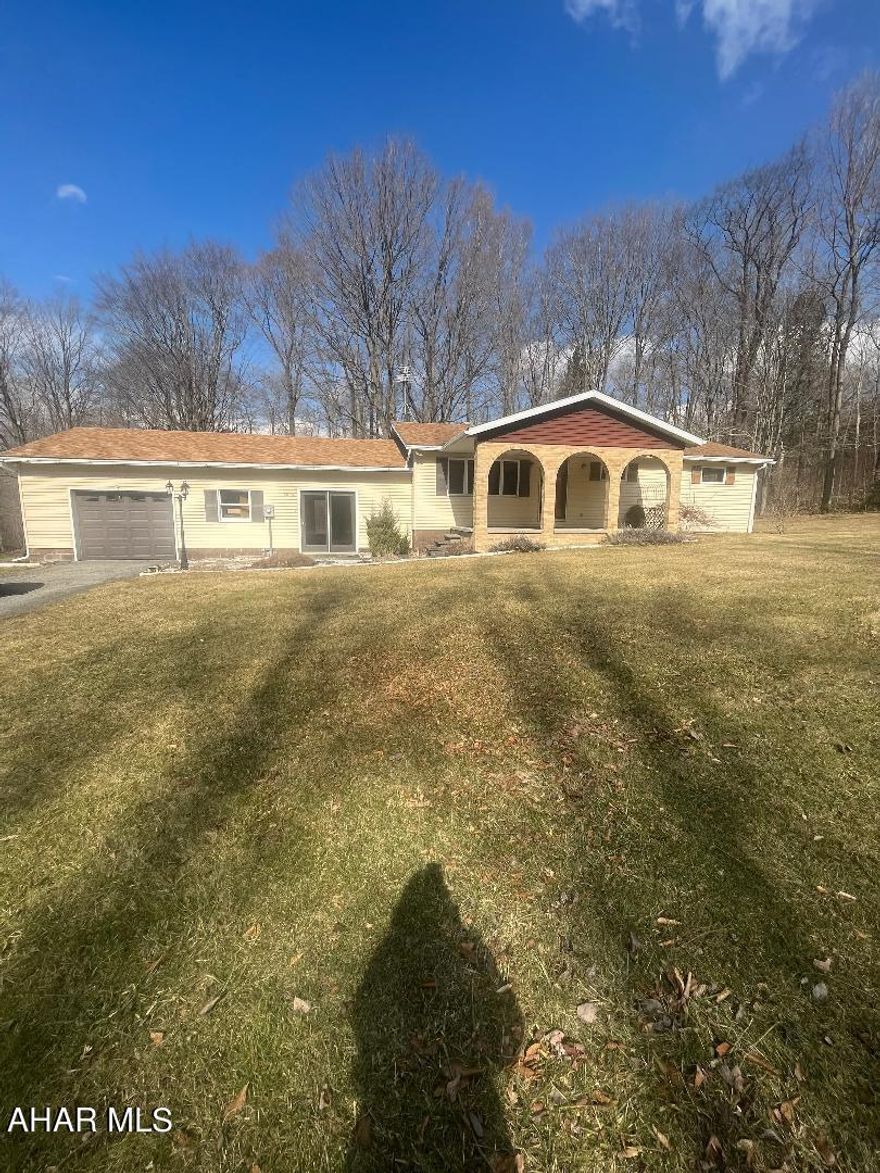 Country living at its best. Nice 3 Bedroom 1 Bath Ranch with attached 1 car garage. Spacious rooms, large level lot.