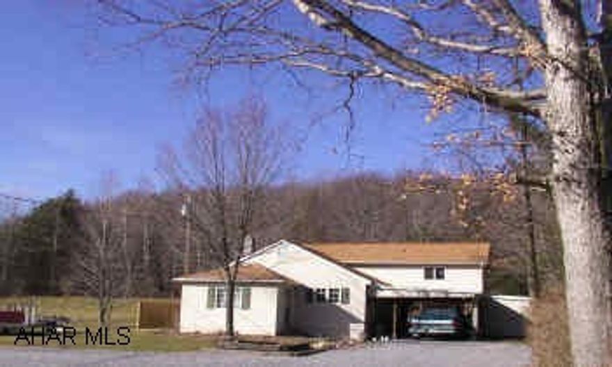 Lovely country home features sunken living room with hardwood floors, river stone trim, gorgeous wood work, master bedroom with cathedral ceiling and dressing room.  Private back yard surrounded by woods.  Pool, central air, first floor family room. Directions:  Off old Route 220 in Vail across from Smith Warehouses. Take shale road back to house.  Lovely country home features sunken living room with hardwood floors, river stone trim, gorgeous wood work, master bedroom with cathedral ceiling and dressing room.  Private back yard surrounded by woods.  Pool, central air, first floor family room.  New siding, windows, roof, and furnace.