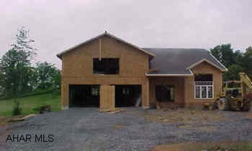 2 story contemporary stone and vinyl sided, 4 bedroom, 2 1/2 baths.  First floor family room, gas fireplace.