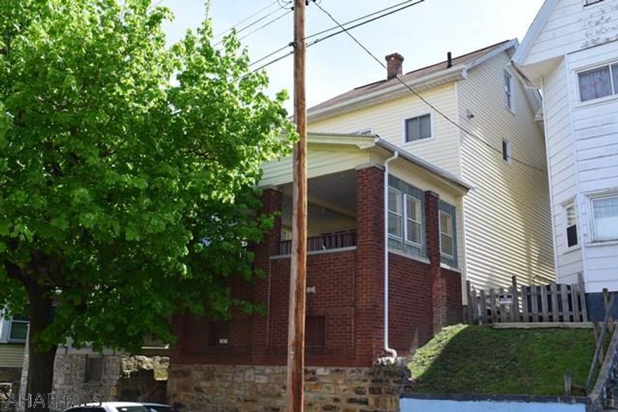 Spacious well maintained 3 bedroom home with a finished walk up attic, large covered front porch and partially fenced in private back yard. Off street private parking in the rear and within walking distance to schools and local parks. Don't wait and miss this one.  Call listing agent today.