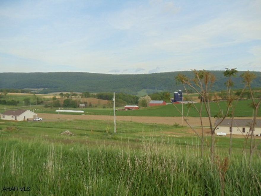 1 Acre Country Setting/Great View of the Mountains. Beautiful building lot. Buyer must dig well.  Previously perk tested South Woodbury Twp./Bedford Co.  Rt 36s from R. Spring thru Woodburg, turn R before Mark Eat Shop (before NBC school) onto Mountain 1 Acre Country Setting/Great View of the Mountains. Beautiful building lot.  Buyer must dig well.  Previously perk tested South Woodbury Twp/Bedford Co.  Rt 36s from R. Spring thru Woodbury, turn R before Mark Eat Shop(before NBC school) onto Mountain View, go 1.3 miles go past Dove Tail Lane and Turn R onto next gravel road on R before 2nd Home.  J-954