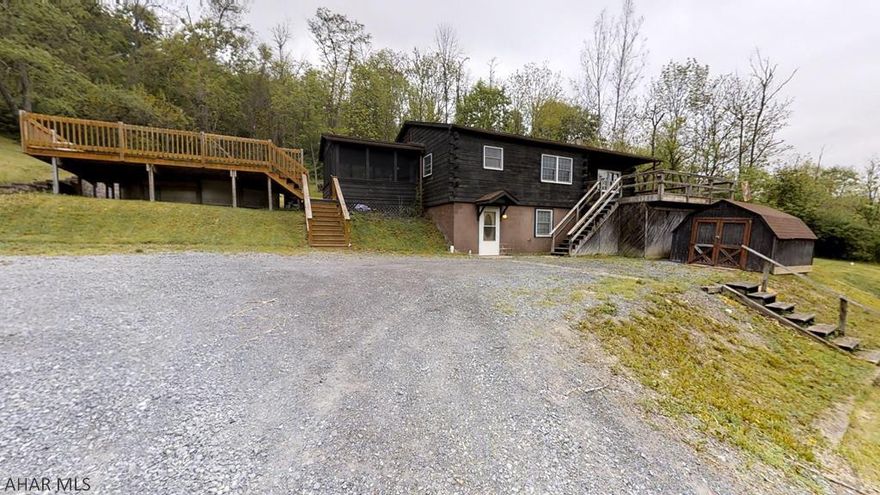Lovely log home tucked away on 3.1 wooded acres.  Finished basement for lots of living space.  Deck and Screened porch as well as fully decked above ground pool w/new liner.A MUST SEE!!!  3DTour can be viewed at:  https://my.matterport.com/?M=uM7TYYMXWoW