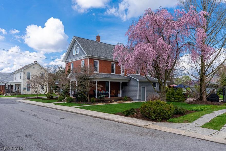 A great find in M-burg Boro. Classic brick with the charm of yesteryear and modern amenities. 1st flr consists of a spacious LR and DR...built-in shelving and wood floors, plus a bonus room that could be a Den or office.  Walk into the kitchen and you'll see that it's the heart of the Home. Beautifully remodeled kitchen with Granite C-tops, recessed lights and newer SS appliances.  Check out the ceiling...it's all exposed for a farm-house feel....cozy on up to the pellet stove. Also, conveniently located, is a 3/4 bath.  2nd flr has a flexible flr plan, 3 or 4 BRs....the 1 room is perfect for a home office. 3rd floor is the teenager's retreat, kids will love this!!!  Outside is a private.33 acre lot and a 1+ car garage...professionally hardscaped, walking distance to park/pool and Mamie's!