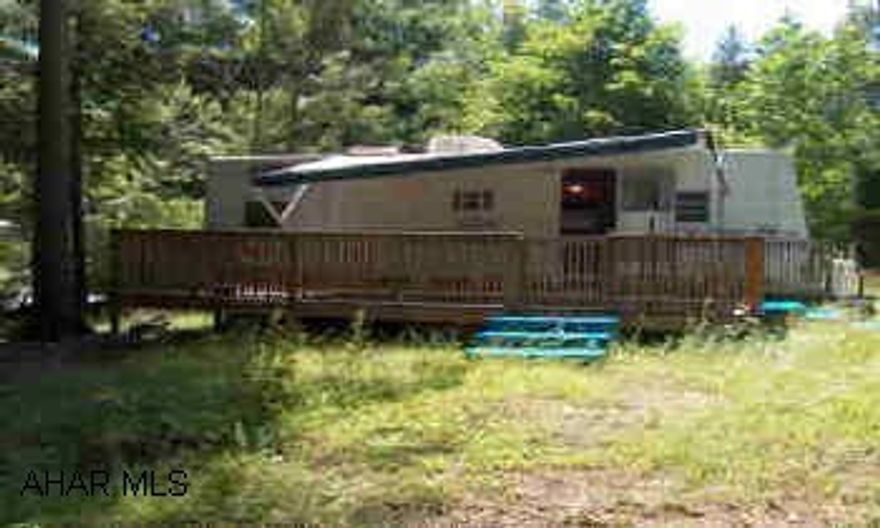 A Beautiful Insbrook 30' camper on large corner lot. Front deck & shed A Beautiful Insbrook 30' camper on large corner lot. Front deck & shed