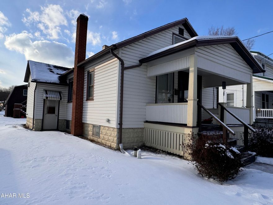 Step into cozy charm with this delightful 2-bedroom, 1-bath home offering convenient one-floor living just moments from town and amenities. The spacious living room flows seamlessly into the adjoining dining room, perfect for gathering with loved ones. Both bedrooms exude comfort, while the kitchen offers plenty of space for meal prep. Enjoy the bonus of an enclosed back porch that leads to a large covered deck—perfect for sipping lemonade on soon to come, lazy summer days. Upstairs, you'll find ample storage space to keep everything tidy. Relax on the covered front porch, where you can enjoy the neighborhood's quiet charm. The detached 1-car garage includes a workshop above, and an additional shed provides even more storage options. With its durable metal roof and undeniable character, this home is a fantastic alternative to renting. Why rent when you can own this cozy haven? Schedule your tour today and make it yours!