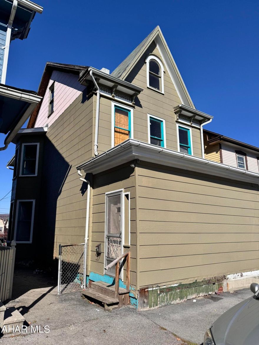Investor special! The front of the house has been painted, electrical panel has been brought up to code by a licensed electrician. New back porch. Needs additional work for completion. Motivated seller!
